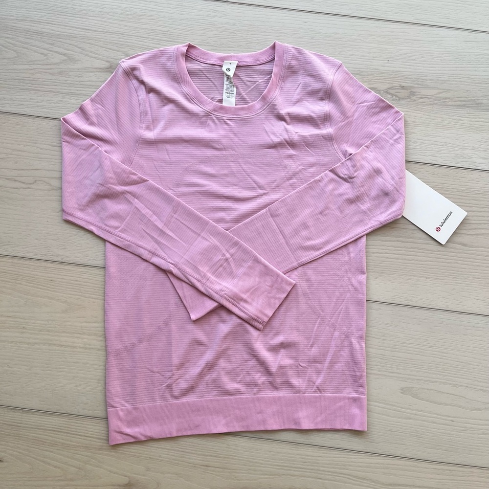 NWT lululemon swiftly relaxed long sleeve shirt hip length, vitapink, size 4